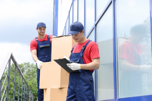 Careful loading of household goods into a moving van