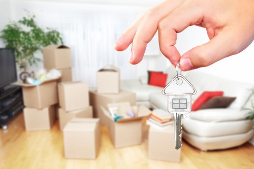 Local movers organizing items in a residential home