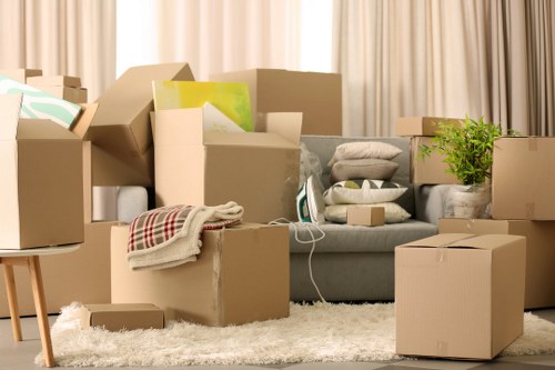 Loading furniture into a removal van near Osidge homes